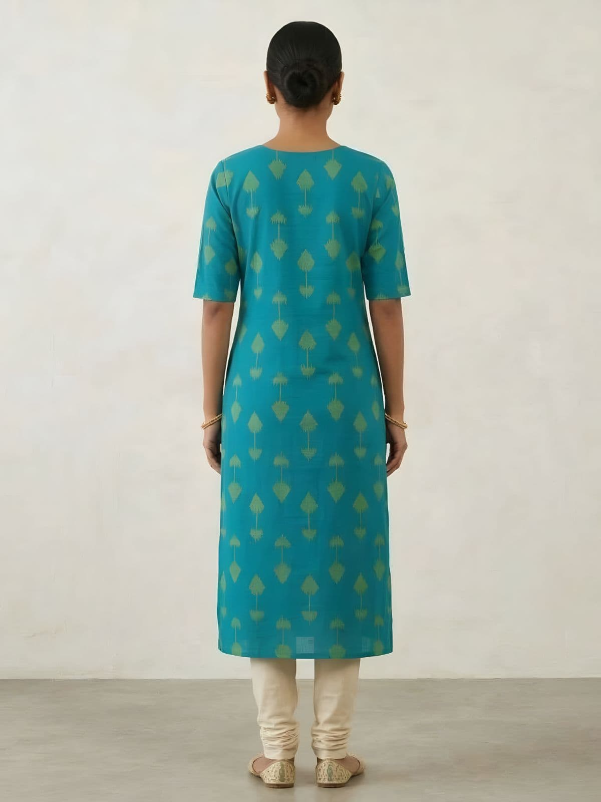 Elegant Turquoise Cotton Kurti with Green Ikat Print and Button Detail - View 2
